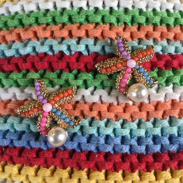 Starfish stud earrings multi coloured or pearl